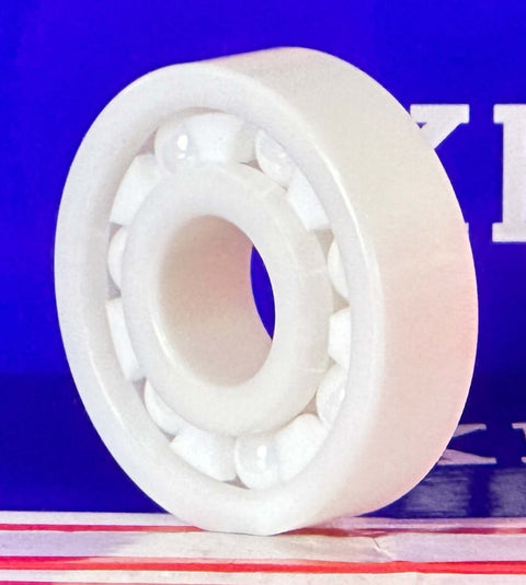 6303 Full Ceramic ZrO2 Ball Bearing 17x47x14mm affiché sur un fond vibrant.