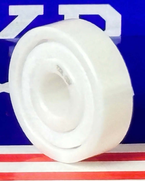 627 Full Ceramic ZrO2 Ball Bearing 7x22x7mm Miniature sur un fond vibrant.