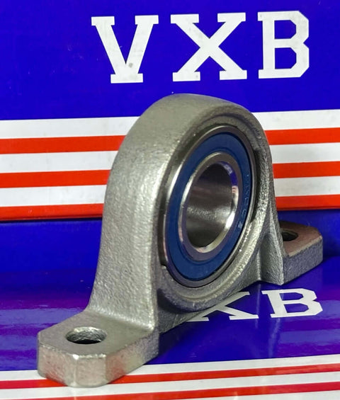 17mm Bore Miniature Stainless Steel Pillow Block Mounted Bearing on a colorful background.