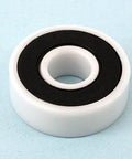 6900-2RS Full Ceramic Bearing 10x22x6mm Si3N4/PTFE side view showcasing the ceramic design and PTFE cage.
