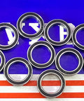 10-Pack Premium 6701-2RS 12x18x4 Sealed Bearings arranged on a colored background, showcasing their chrome steel design.