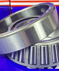 Close-up of the 33112 Tapered Roller Wheel Bearing 60x100x30 with cone and cup made from 52100 chrome steel, designed for radial and axial loads.