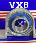 30mm Bore Miniature Stainless Steel Pillow Block Mounted Bearing with blue seal and metal housing.