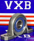 12mm Bore Miniature Stainless Steel Pillow Block Mounted Bearing on a display with VXB branding.