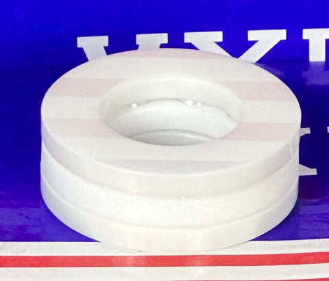 青い背景に表示されるフルセラミック51204 ZrO2Thrust  20x40x14mm 。