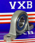 17mm Bore Miniature Stainless Steel Pillow Block Mounted Bearing on a colorful background.