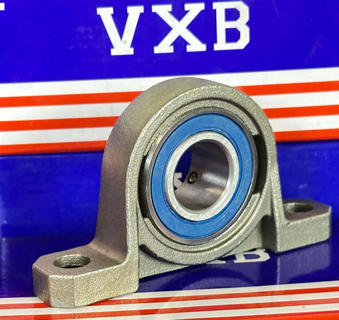 20mm Bore Miniature Stainless Steel Pillow Block Mounted Bearing on a colorful background.