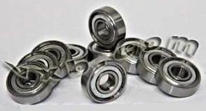 10-Pack R8PP Ball Bearings 8x22x7mm - Miniature arranged on a surface showcasing their double metal shields and carbon steel construction.