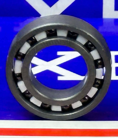 Front view of 11.5x21x5 Full Ceramic Silicon Nitride Bearing showing PTFE cage and Si3N4 balls against a blue background.