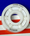 6-Ball 608 Full Ceramic Ball Bearing 8x22x7mm Miniatura em um fundo vermelho e azul.